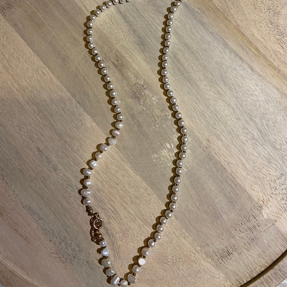Long costume pearl necklace